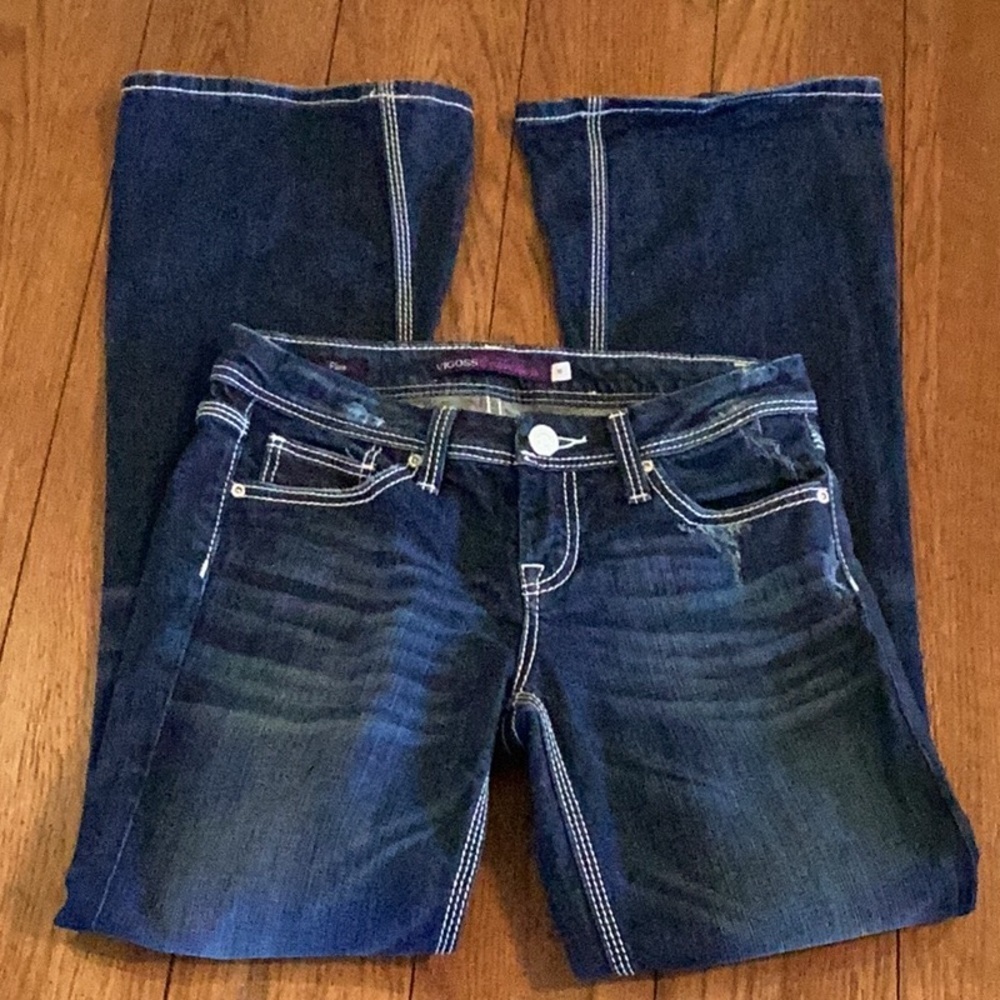 Vigoss vintage Dark Blue distressed Flare leg Jeans. Women’s size 5.